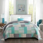 couvre lit matelassé artisanal et chaleureux gris et vert