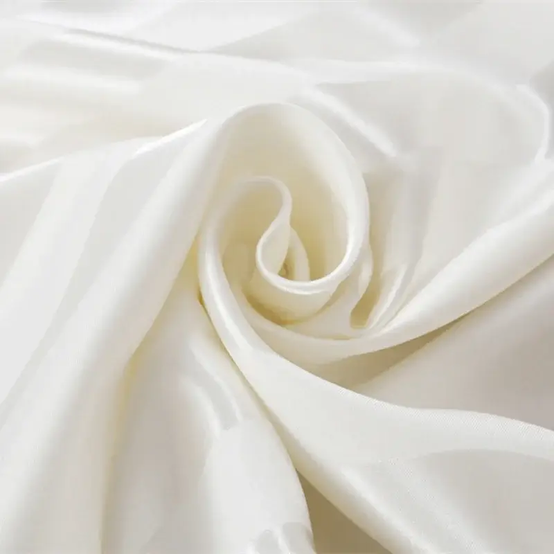 présentation de la qualité d'un taie d'oreiller en satin, jacquard de haute qualité